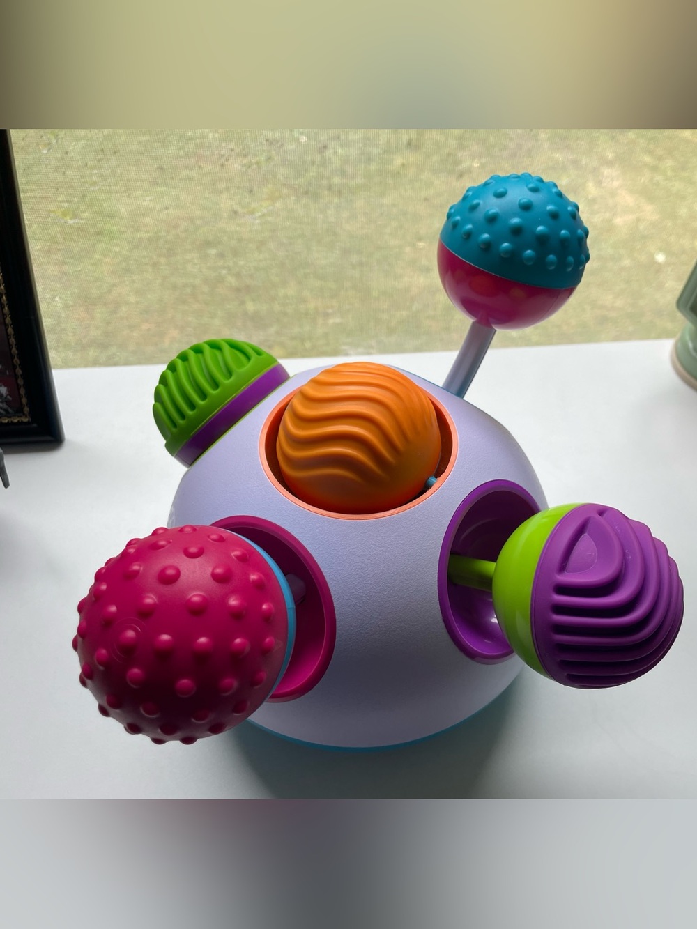 Fat Brain toys Pop & Grip sensory toy.
